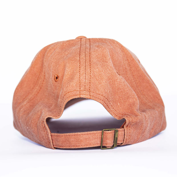 Washed canvas gives this camper a laid-back, relaxed feel.  Featurers an adjustable strap back for a comfy fit.