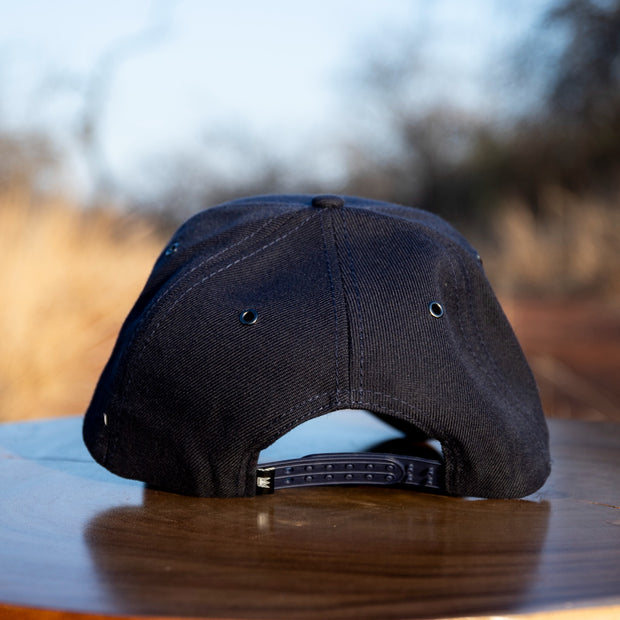 Navy Uflex Leather Snapback Cap